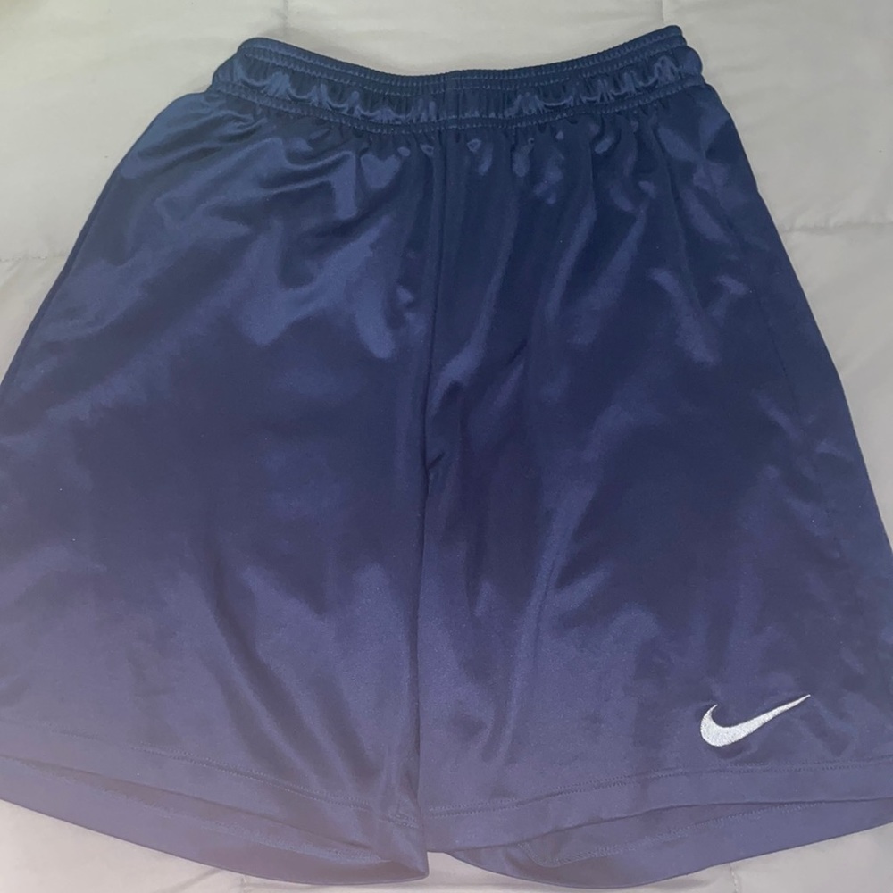 Blue Nike shorts